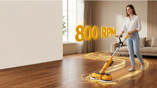 Close-up of Qimedo M3 Pro electric mop head demonstrating 800 RPM high-torque dual spin action on a dark tile floor.
