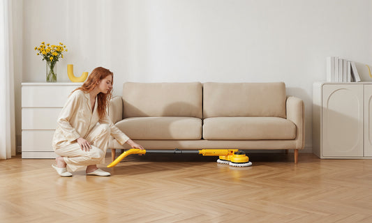M2 7.2V Dual-Head Mop used in a home environment, a female user cleaning the floor with ease, ideal for household use.