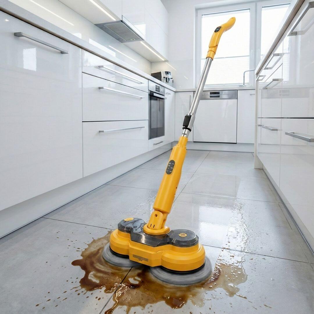 Qimedo yellow cordless electric spin mop cleaning light grey tiles in a modern kitchen.